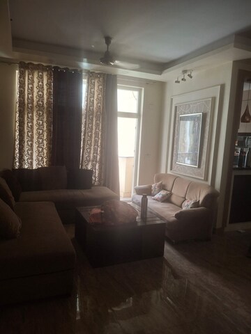 Living Room in 3 BHK Apartment at Amrapali Silicon City, Sector 76 – for Rent