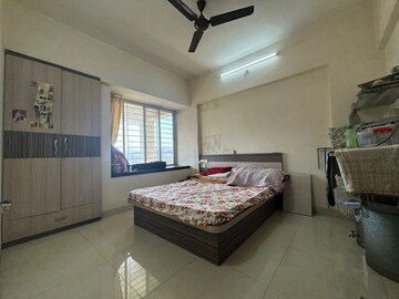 Bedroom in 2 BHK Apartment at Majestique Landmark Miami, Dhayari – for Sale