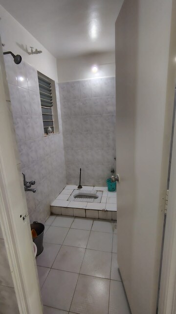 Bathroom in 2 BHK Apartment at Seema Garden, Kothrud – for Rent