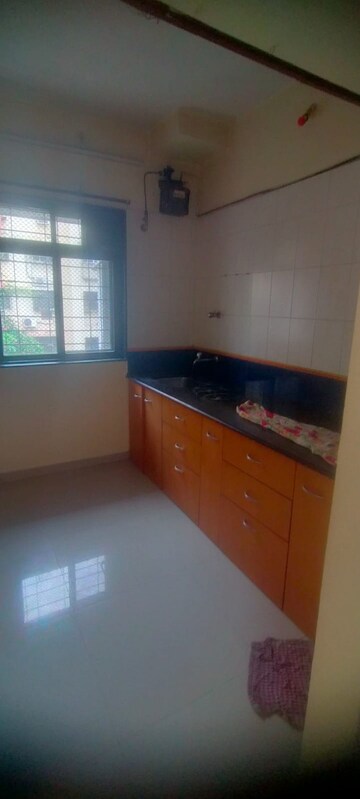 Kitchen in 1 BHK Apartment at Puranik City, Kasarvadavali – for Rent