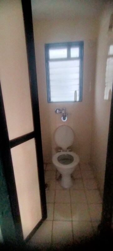 Bathroom in 1 BHK Apartment at Puranik City, Kasarvadavali – for Rent