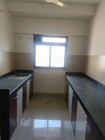 Kitchen in 3 BHK Apartment at Lodha Splendora, Ghodbunder Road – for Rent