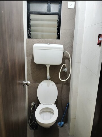 Bathroom in 1 BHK Apartment at Raunak City 3, Kalyan West – for Sale