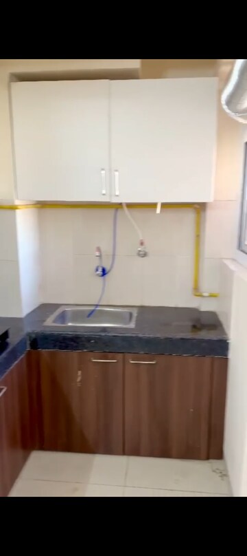 Kitchen in 1 BHK Apartment at Wave Dream Homes, Wave City – for Rent