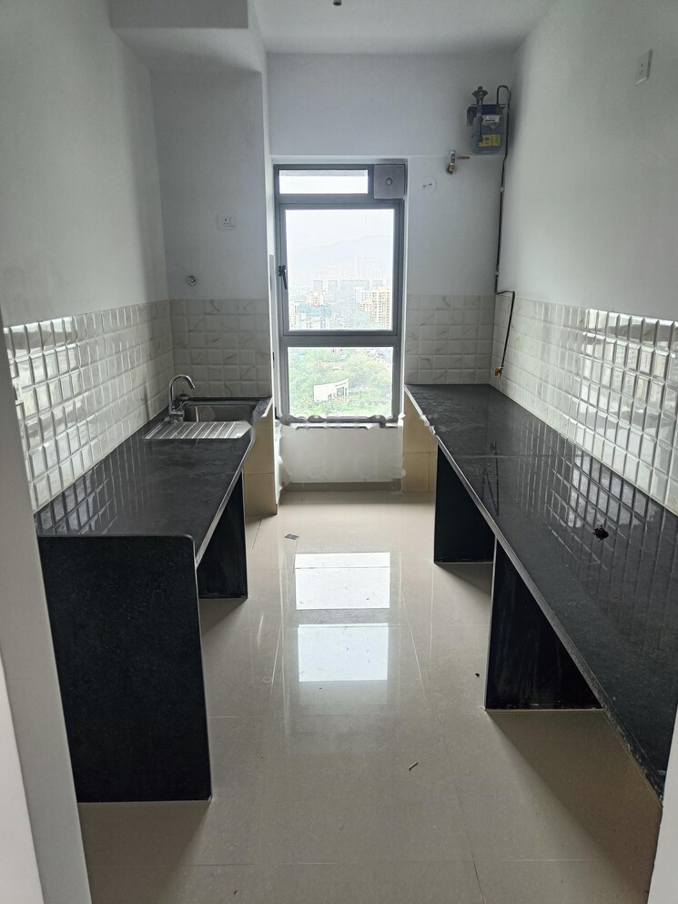 Kitchen, kalpataru-immensa 2 Bedroom 756 Sq.Ft. Apartment In Kolshet Road Thane 9193010
