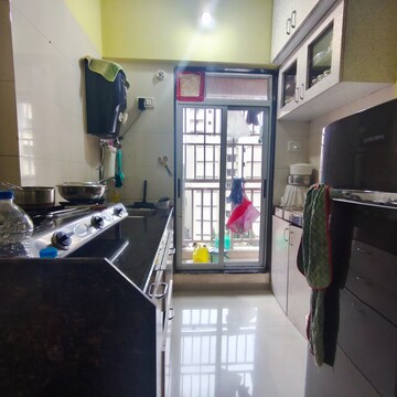 Kitchen in 1 BHK Apartment at Laabh Shubh Sanket Complex, Ghodbunder Road – for Rent