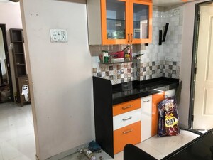 Kitchen in 3 BHK Apartment at Sudarshan Sky Garden, Ghodbunder Road – for Sale