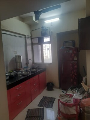 Kitchen in 3 BHK Apartment at Sudarshan Sky Garden, Ghodbunder Road – for Sale