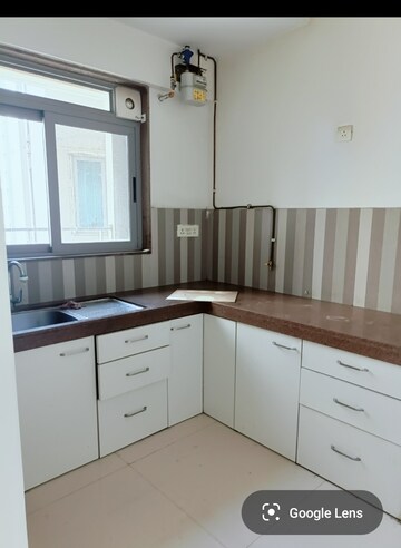 Kitchen in 2 BHK Apartment at Kalpataru Parkcity Sunrise B, Kolshet Road – for Sale