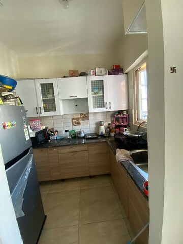 Kitchen in 2 BHK Apartment at Supertech Czar Suites, Omicron I Greater Noida – for Sale