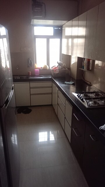 Kitchen in 2 BHK Apartment at Om Sai Plaza, Ghodbunder Road – for Rent