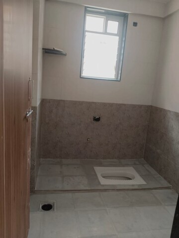Bathroom in 2 BHK Apartment at Karve Nagar – for Rent