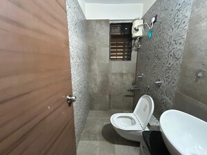 Bathroom in 3 BHK Apartment at Bhoomi Acres, Waghbil – for Sale