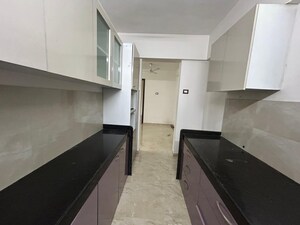 Kitchen in 3 BHK Apartment at Bhoomi Acres, Waghbil – for Sale