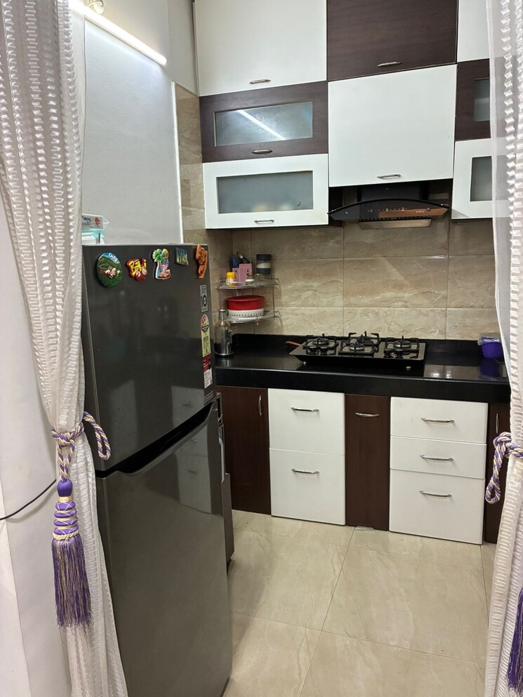 Kitchen, bhojwani-hi-face 2 Bedroom 800 Sq.Ft. Apartment In Pimple Saudagar Pune 9193682