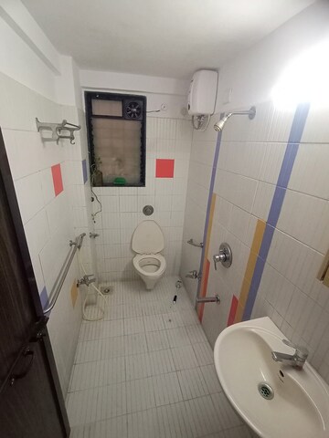 Bathroom in 2 BHK Apartment at Asmi Vintage, Goregaon West – for Rent
