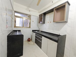 Kitchen in 2 BHK Apartment at Vishesh Balaji Symphony, New Panvel – for Sale
