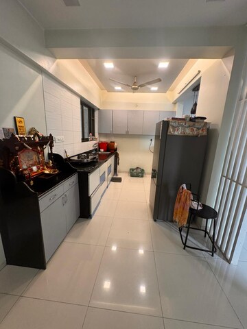 Kitchen in 2 BHK Apartment at Karan Sara, Baner – for Rent