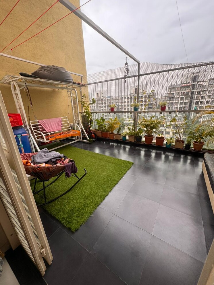 Balcony, karan-sara 2 Bedroom 702 Sq.Ft. Apartment In Baner Pune 9193803