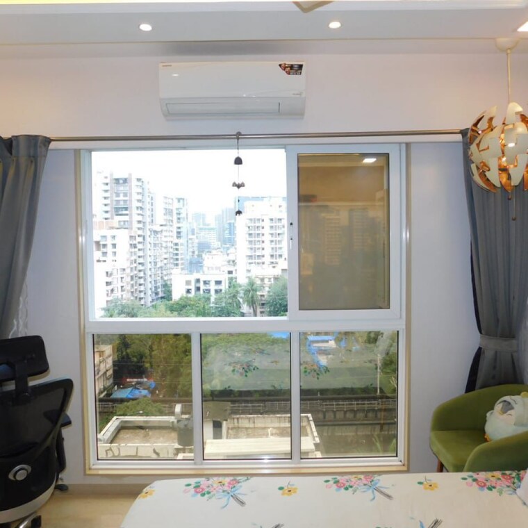 Living Room, platinum-life 3 Bedroom 900 Sq.Ft. Apartment In Munshi Nagar Mumbai 9193818