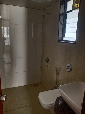 Bathroom in 2 BHK Apartment at Saarrthi Skybay, Mahalunge – for Rent