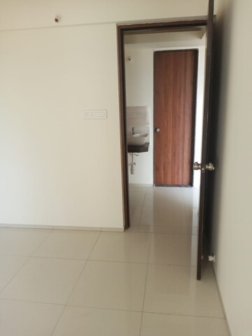 Room in 2 BHK Apartment at Saarrthi Skybay, Mahalunge – for Rent