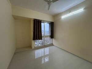 Room in 2 BHK Apartment at Cosmos Jewels, Ghodbunder Road – for Sale