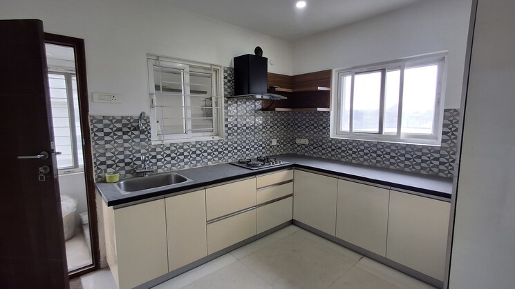 Kitchen, movie-towers 3 Bedroom 2615 Sq.Ft. Apartment In Kokapet Hyderabad 9194107