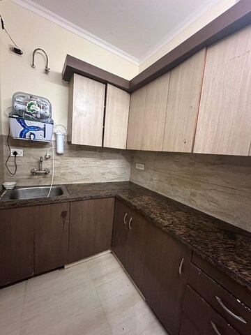 Kitchen in 1 BHK Apartment at Sector 23 Dwarka – for Sale