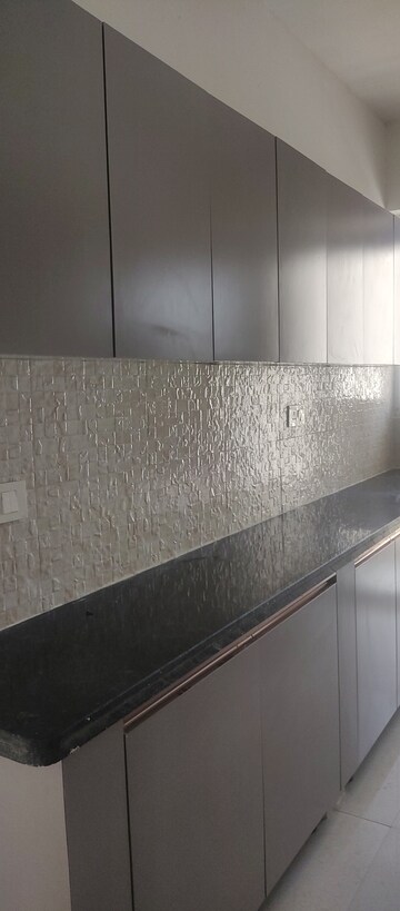Kitchen in 2 BHK Apartment at Signature The Millennia 2, Sector 37d – for Rent