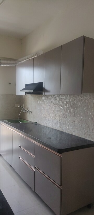 Kitchen in 2 BHK Apartment at Signature The Millennia 2, Sector 37d – for Rent