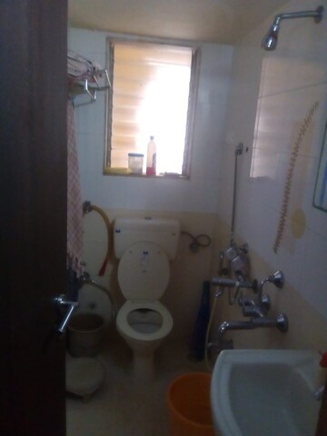 Bathroom in 4 BHK Apartment at Happy Valley, Manpada – for Rent