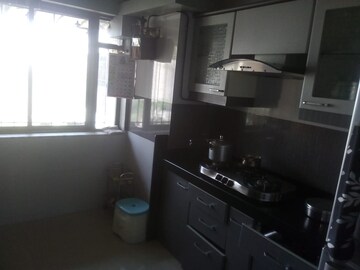 Kitchen in 4 BHK Apartment at Happy Valley, Manpada – for Rent