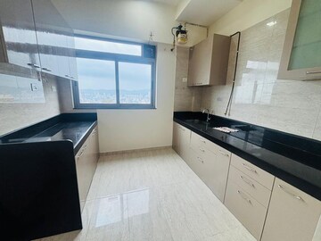 Kitchen in 2 BHK Apartment at Sheth Auris Serenity Tower 1, Malad West – for Rent
