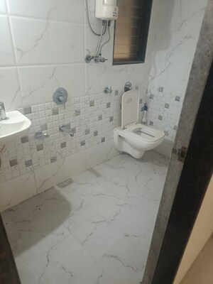 Bathroom in 1 BHK Apartment at Charkop Silver Presidency, Kandivali West – for Sale