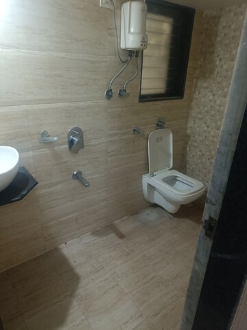 Bathroom in 1 BHK Apartment at Charkop Silver Presidency, Kandivali West – for Sale