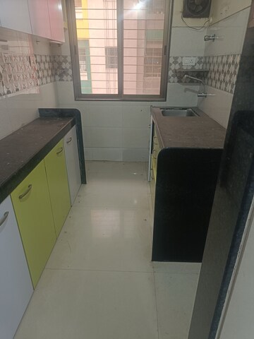 Kitchen in 1 BHK Apartment at Charkop Silver Presidency, Kandivali West – for Sale
