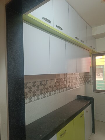 Kitchen in 1 BHK Apartment at Charkop Silver Presidency, Kandivali West – for Sale