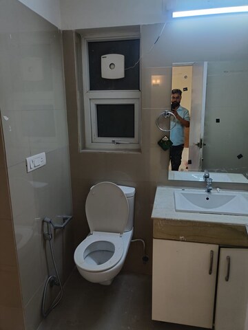 Bathroom in 3 BHK Apartment at Shapoorji Pallonji Joyville Phase 2, Sector 102 – for Rent