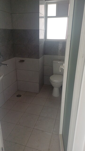 Bathroom in 3 BHK Apartment at Surat Residency, Vrinda Van Colony – for Sale