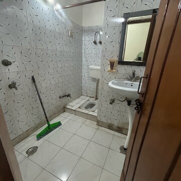 Bathroom in 2 BHK Builder Floor at Kotla Mubarakpur – for Rent