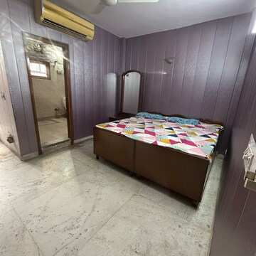 Bedroom in 2 BHK Builder Floor at Kotla Mubarakpur – for Rent
