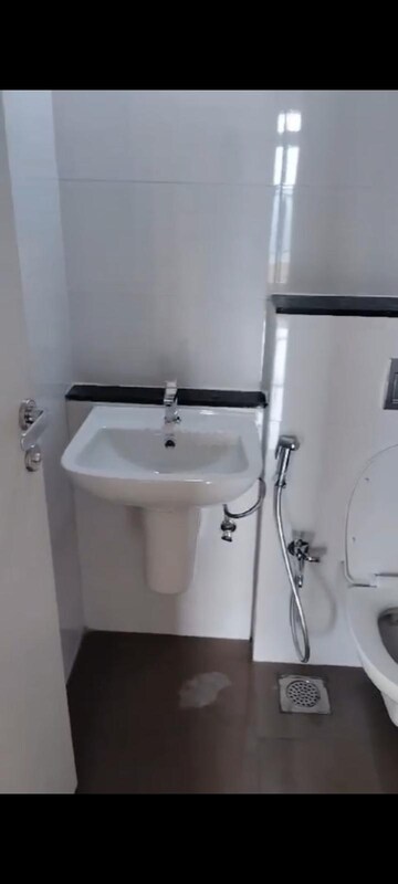 Bathroom in 3 BHK Apartment at Rustomjee Azziano Wing D, Thane West – for Rent