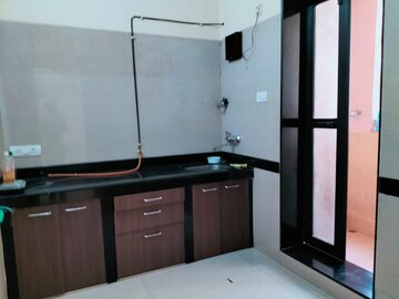 Kitchen in 1 BHK Apartment at K Raheja Raheja Residency, Malad East – for Rent
