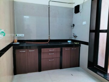 Kitchen in 1 BHK Apartment at K Raheja Raheja Residency, Malad East – for Rent