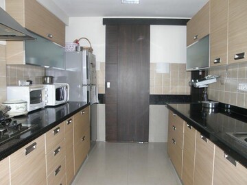 Kitchen in 3 BHK Apartment at Raheja Atlantis, Lower Parel – for Rent