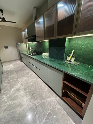 Kitchen in 4 BHK Builder Floor at DLF Gateway Tower, Dlf Phase ii – for Rent