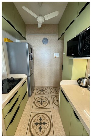 Kitchen in 2 BHK Apartment at Manik Moti Varsova, Versova – for Sale