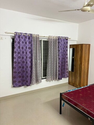 Bedroom in 2 BHK Apartment at Kolte Patil Aleria, Kharadi – for Rent