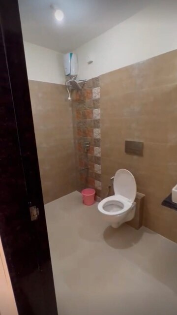 Bathroom in 2 BHK Apartment at Bini Winspace Amelio, Andheri West – for Rent